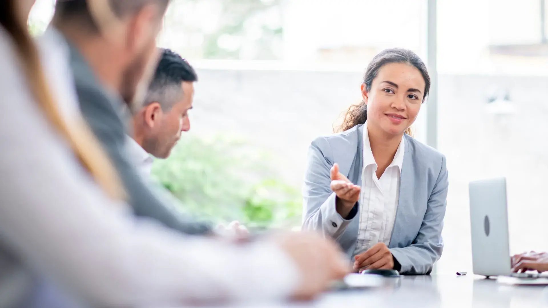 A cybersecurity expert woman discussing the creation of a response plan for a data breach