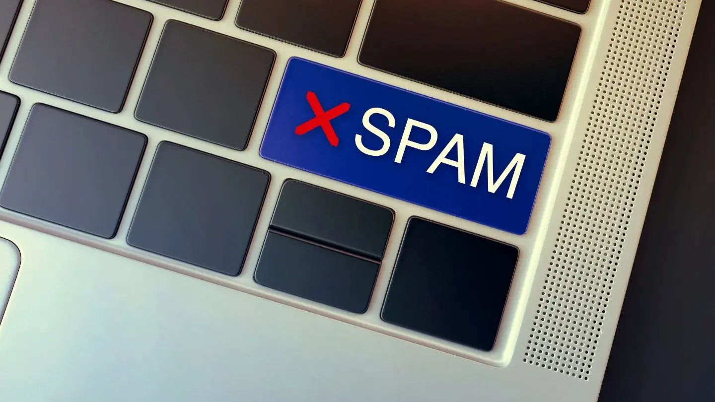 An image of a keyboard with one of the keys replaced with the word “SPAM”