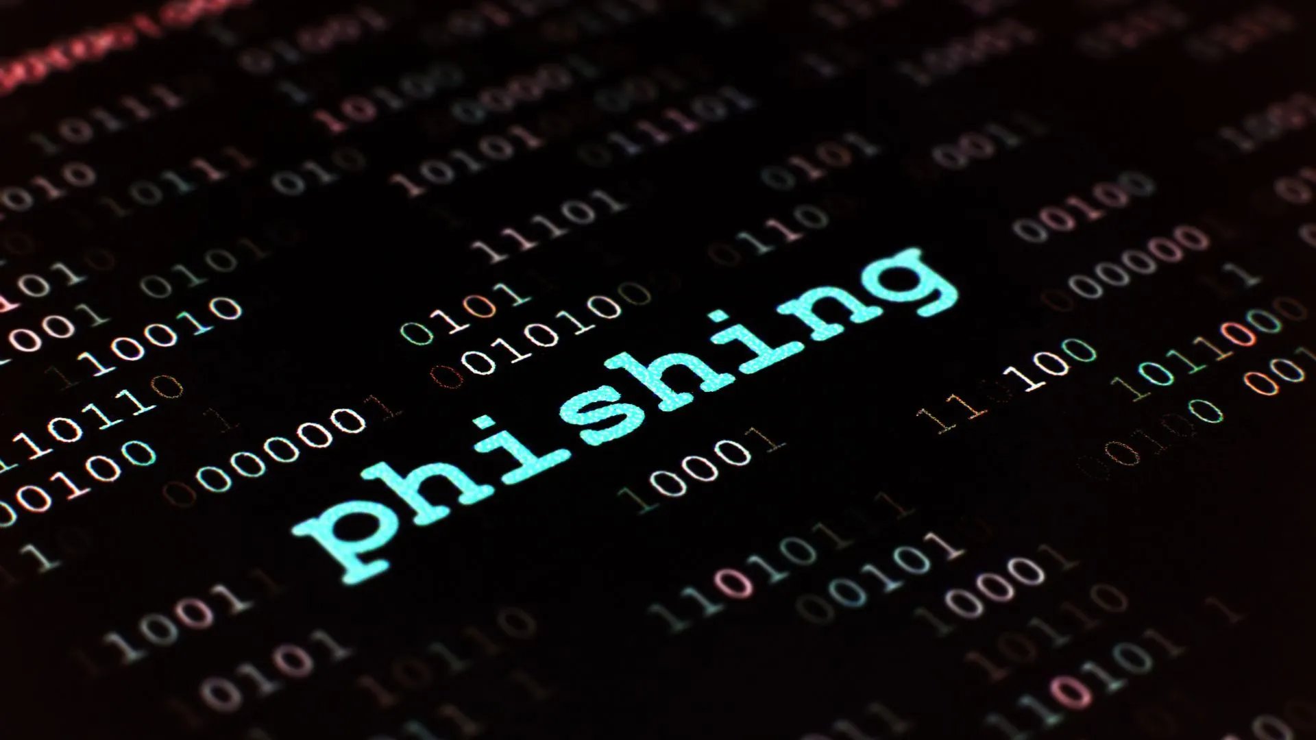  Image with the word “phishing” in the center front, with a background of black and white binary code decor